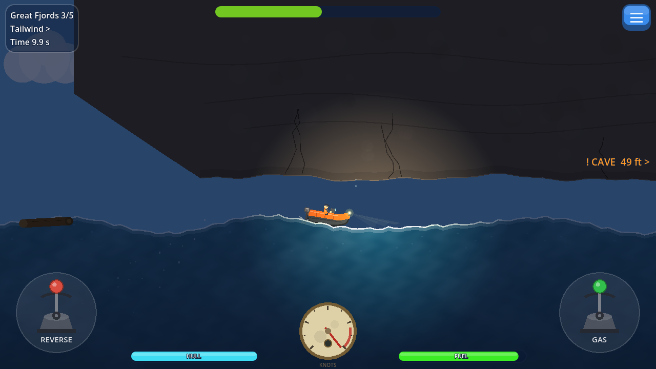 Boat with its headlight on entering a dark sea cave